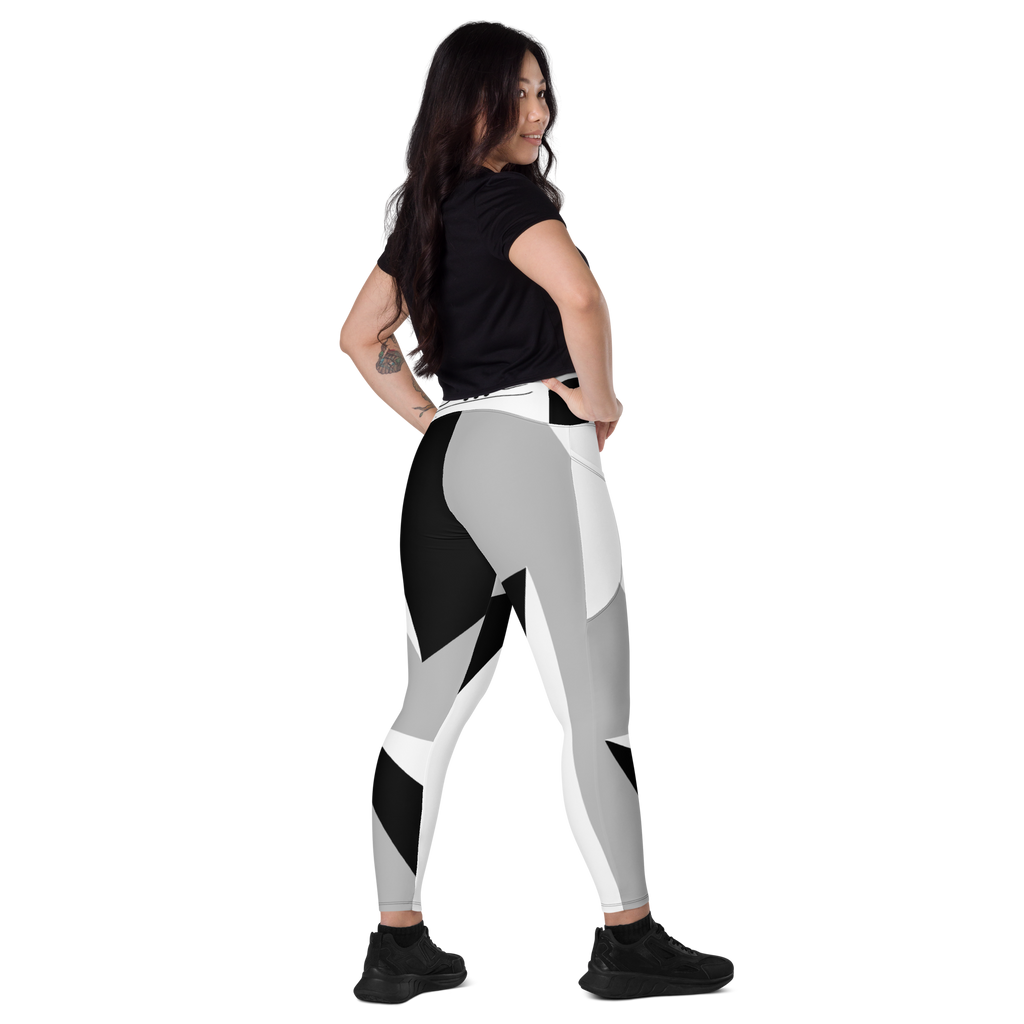 http://www.thebelineproducts.com/cdn/shop/products/all-over-print-crossover-leggings-with-pockets-white-right-back-62e85ac7571b3_1024x.png?v=1659394771